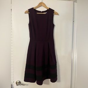 Calvin Klein Dark Purple Dress with Black Stripes Around the Bottom. Size 2.